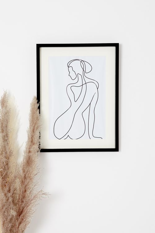 Sitting Woman Framed Wall Art