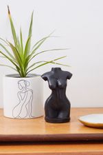 WOMAN-S-BODY-CANDLE-IN-BLACK-1